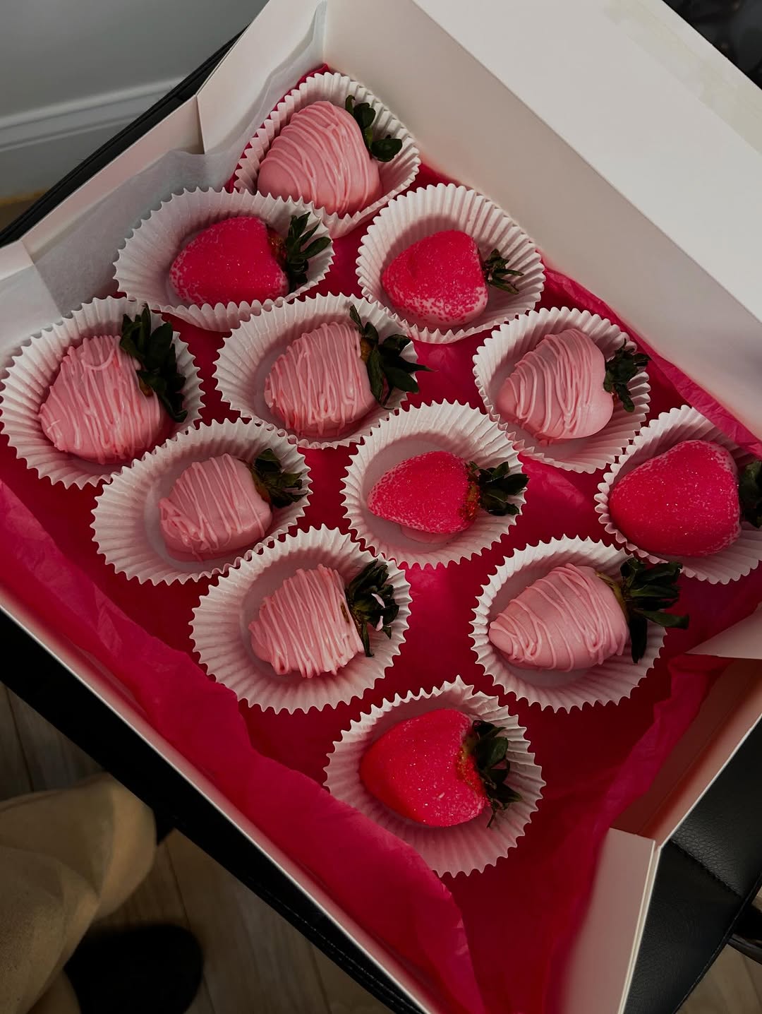 Chocolate-covered strawberries arranged in a gift box