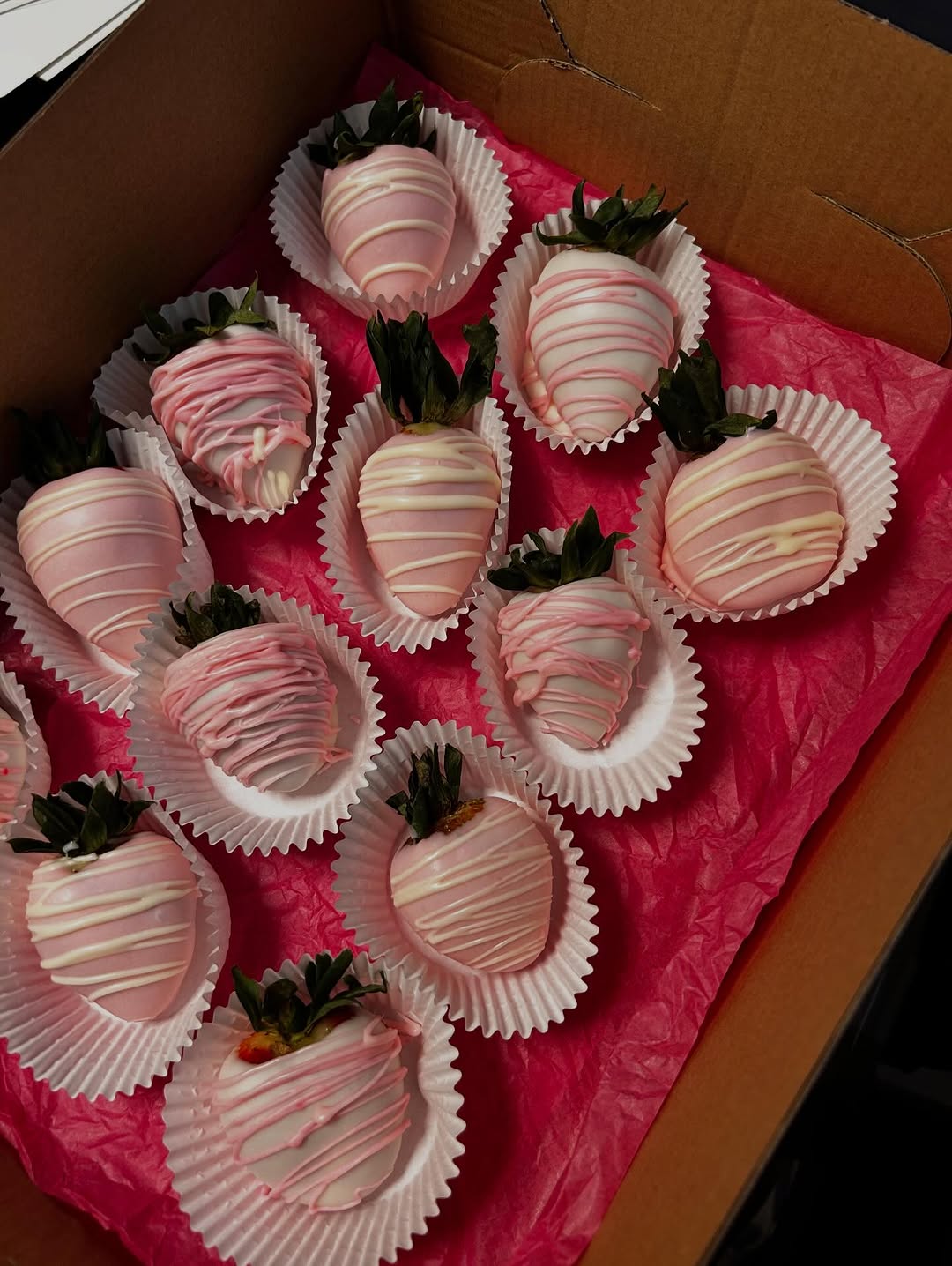 Pink and white chocolate-covered strawberries