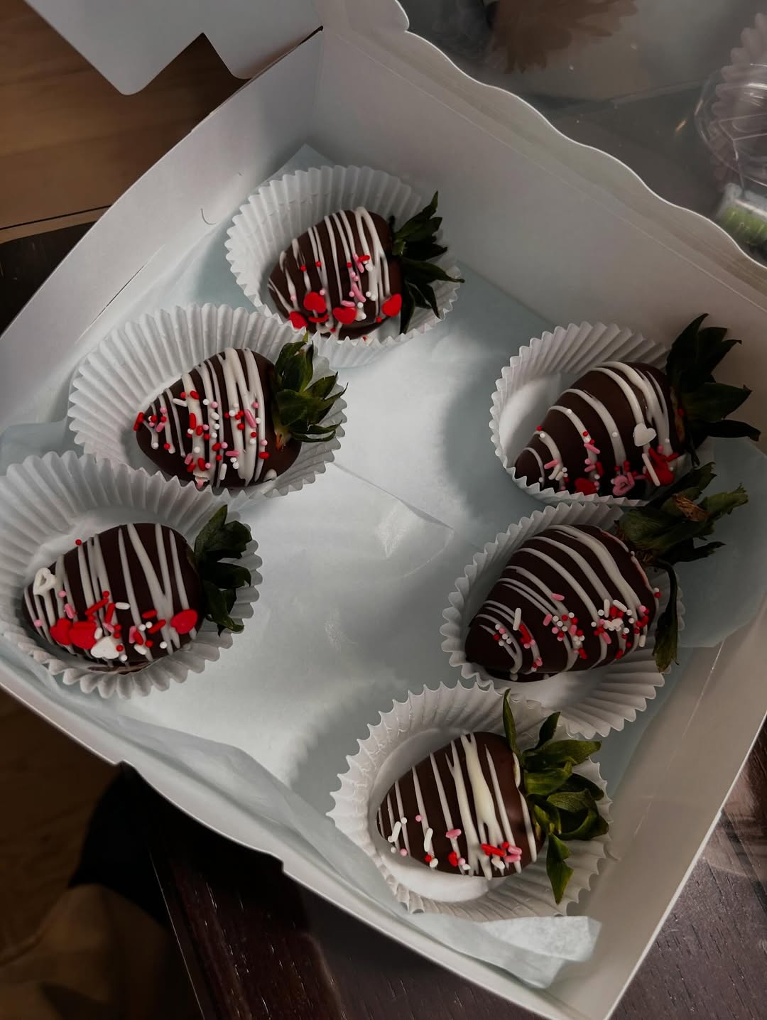Chocolate-covered strawberries with sprinkles