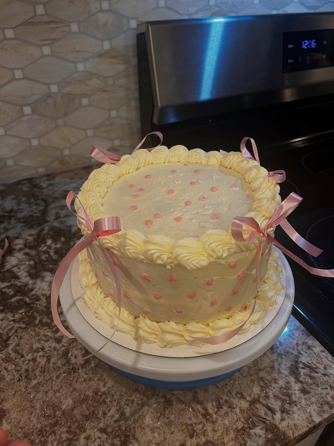 Custom cake with pink ribbon details