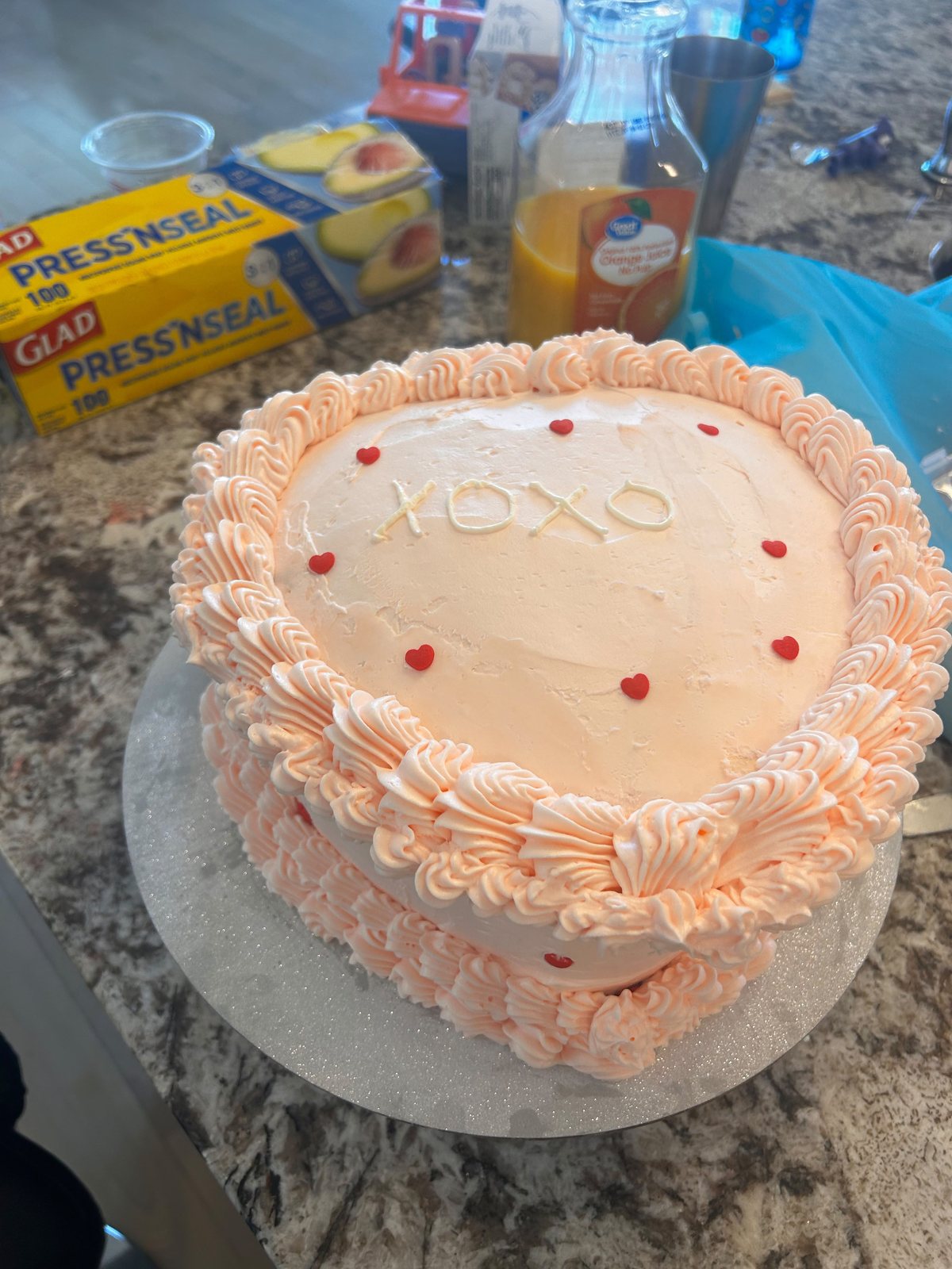 Peach-toned celebration cake on display