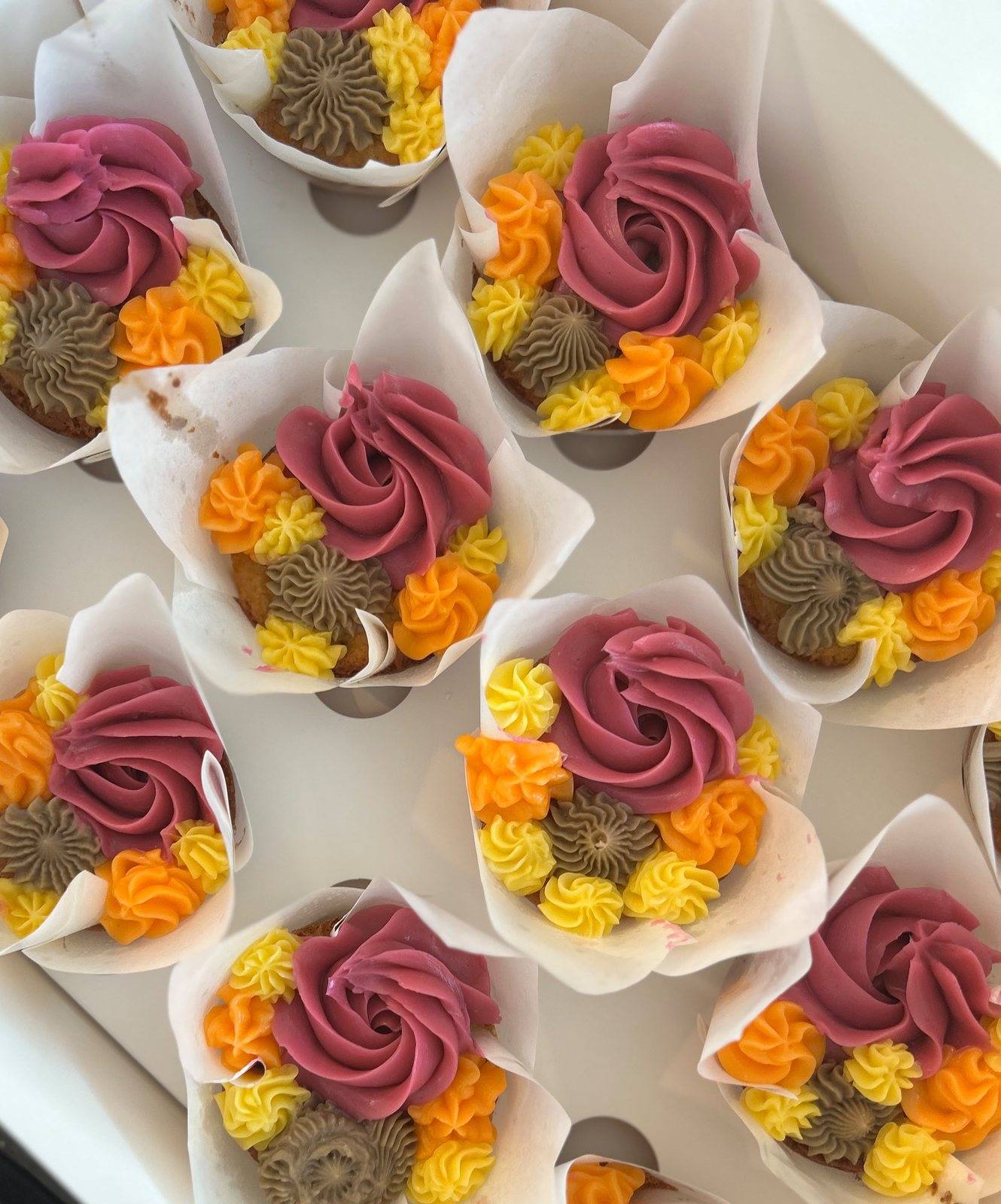 Pink and golden floral cupcakes