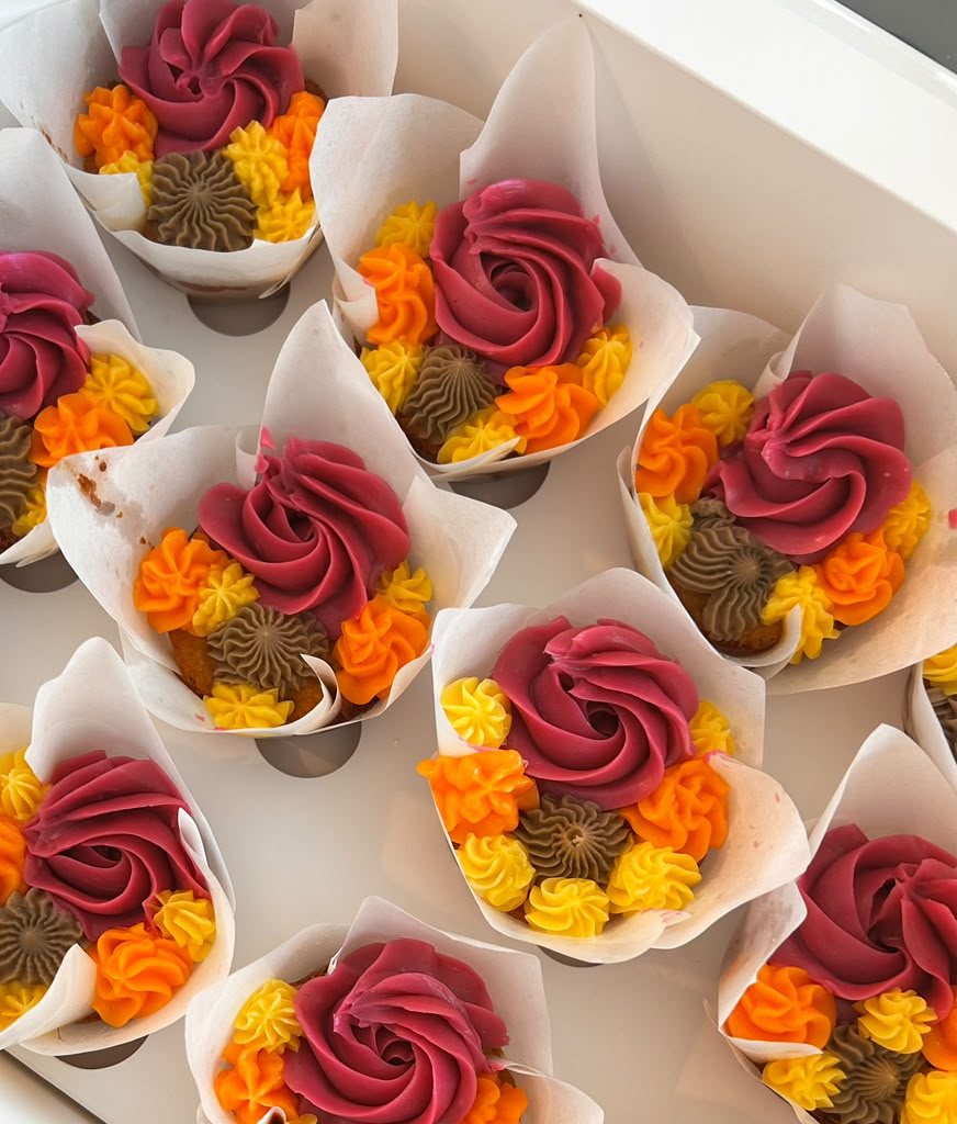 Pink and orange swirled cupcakes